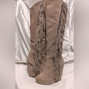 Well love Steve Madden knee high boots.